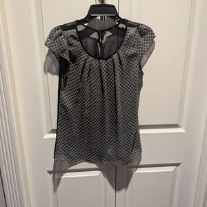 Elegant Black and White Patterned Blouse